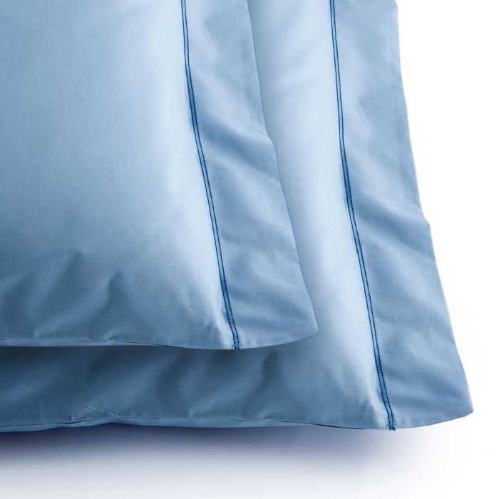 Due cuscini in cotone biologico certificato colore cielo