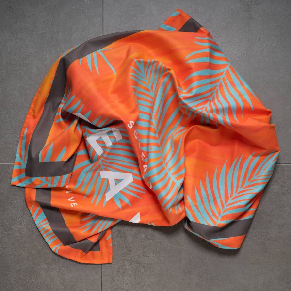 palms beach towel thrown